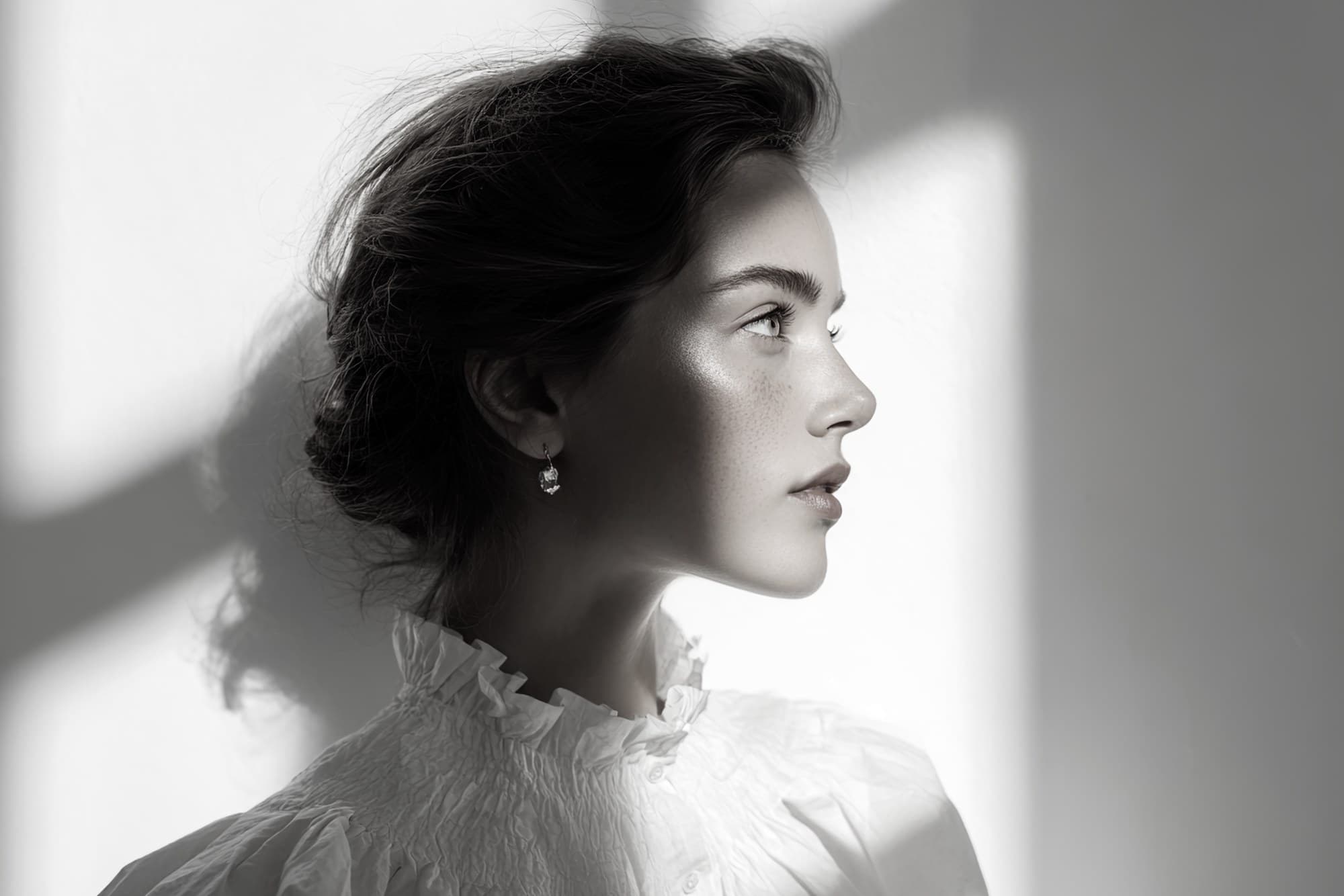 Profile portrait of a woman in soft natural light